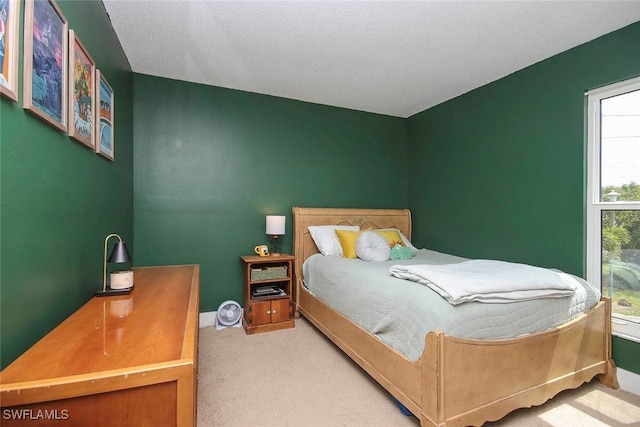 8849 Somerset Blvd, Fort Myers, FL 33919 - bedroom with carpet flooring and baseboards