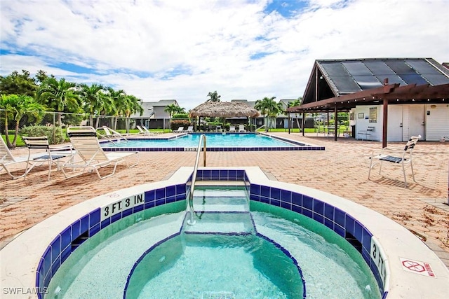 8849 Somerset Blvd, Fort Myers, FL 33919 - community pool featuring a community hot tub, a gazebo, and a patio area