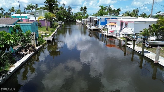2595 Pine St, Matlacha, FL 33993 - dock area featuring boat lift and a water view