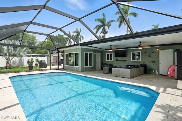 1423 Charles Rd, Fort Myers, FL 33919 - view of pool with an outdoor hangout area, a ceiling fan, a patio area, and glass enclosure