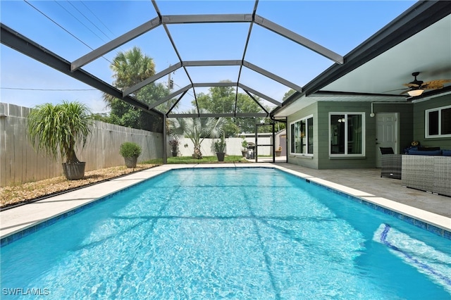 1423 Charles Rd, Fort Myers, FL 33919 - view of pool with a fenced backyard, a patio, a ceiling fan, an outdoor hangout area, and glass enclosure