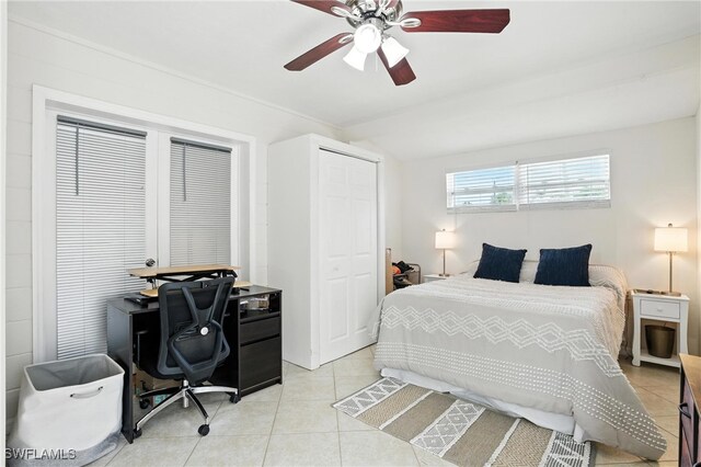 1423 Charles Rd, Fort Myers, FL 33919 - bedroom featuring light tile patterned floors, a desk, a ceiling fan, and a closet