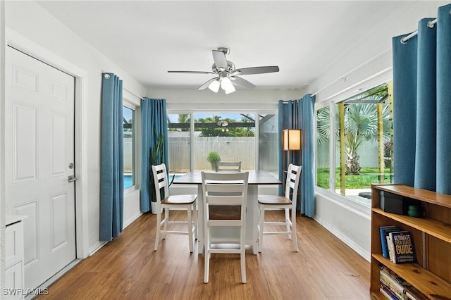 1423 Charles Rd, Fort Myers, FL 33919 - dining room featuring wood finished floors and a ceiling fan