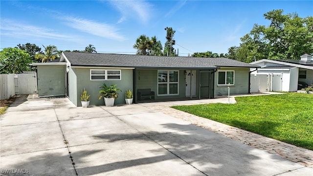 1423 Charles Rd, Fort Myers, FL 33919 - single story home featuring concrete driveway and stucco siding