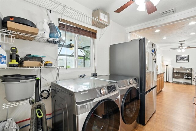 1423 Charles Rd, Fort Myers, FL 33919 - laundry area with a ceiling fan, light wood-style floors, washing machine and clothes dryer, and recessed lighting