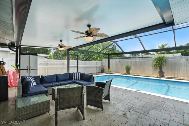 1423 Charles Rd, Fort Myers, FL 33919 - view of pool featuring outdoor lounge area, a patio, a fenced backyard, ceiling fan, and a lanai