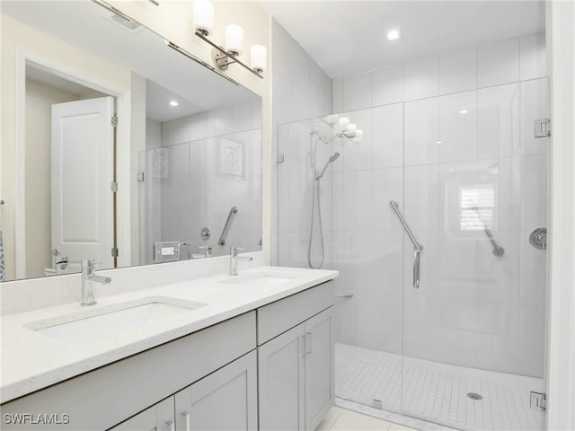 7524 Carnegie Way, Naples, FL 34119 - bathroom featuring a stall shower, double vanity, and recessed lighting