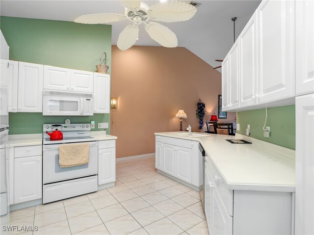 1170 Partridge Ln Unit 202, Naples, FL 34104 - kitchen featuring white appliances, ceiling fan, white cabinets, light countertops, and high vaulted ceiling