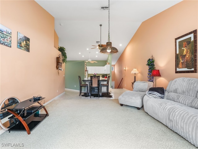 1170 Partridge Ln Unit 202, Naples, FL 34104 - living room featuring light colored carpet, a ceiling fan, high vaulted ceiling, and recessed lighting