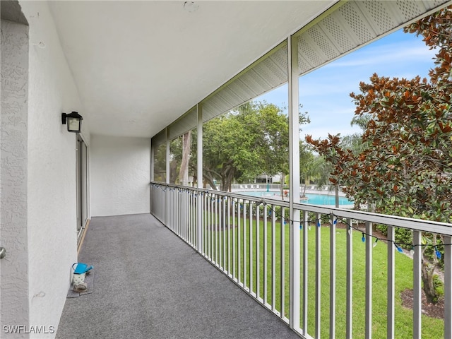 1170 Partridge Ln Unit 202, Naples, FL 34104 - balcony featuring view of pool area