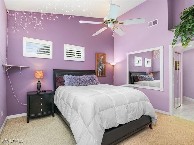 1170 Partridge Ln Unit 202, Naples, FL 34104 - carpeted bedroom featuring high vaulted ceiling and a ceiling fan