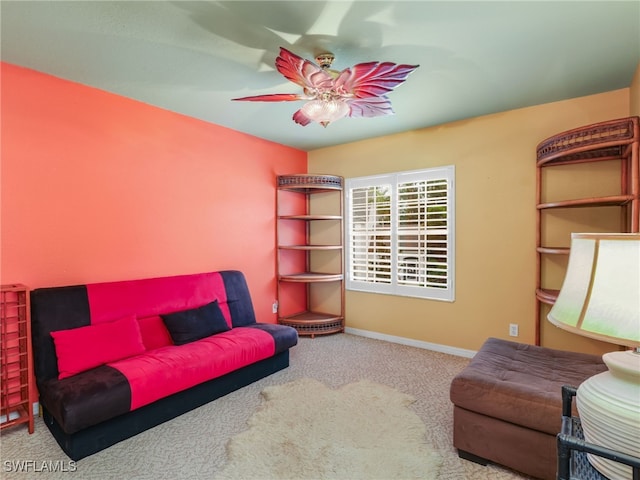 1170 Partridge Ln Unit 202, Naples, FL 34104 - sitting room with carpet and a ceiling fan