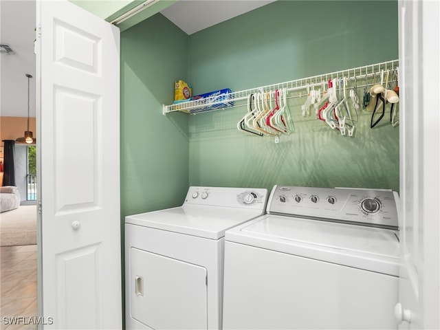1170 Partridge Ln Unit 202, Naples, FL 34104 - washroom with separate washer and dryer