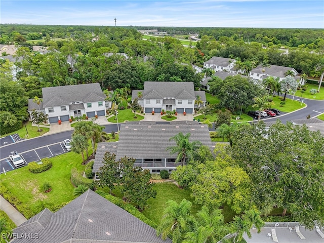 1170 Partridge Ln Unit 202, Naples, FL 34104 - aerial perspective of suburban area with a tree filled landscape