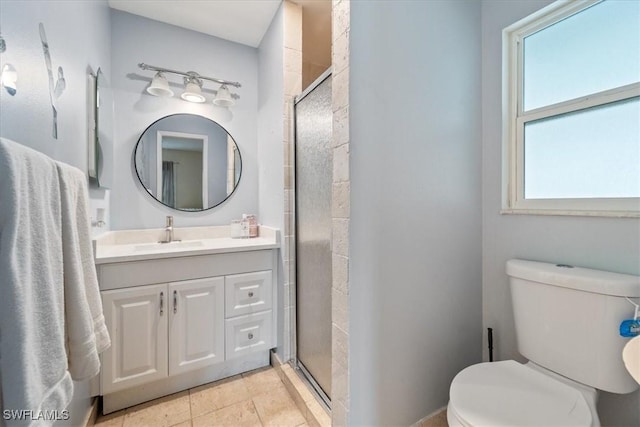 17236 Lee Rd, Fort Myers, FL 33967 - bathroom with plenty of natural light, vanity, a stall shower, and tile patterned floors