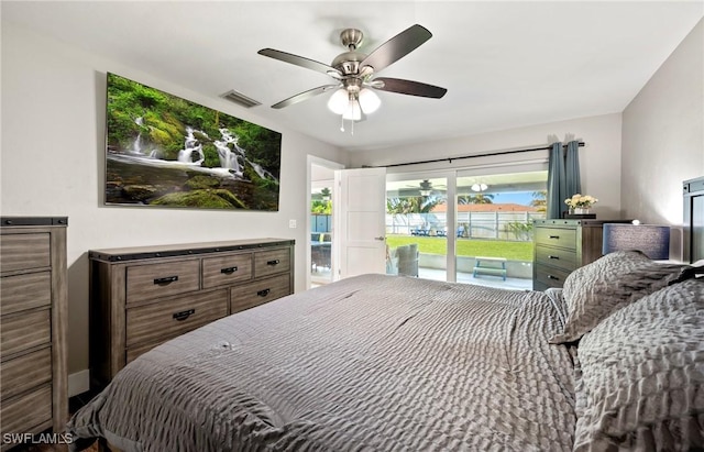 718 Coral Dr, Cape Coral, FL 33904 - bedroom with access to exterior and a ceiling fan