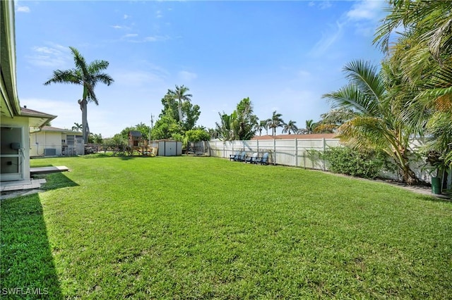 718 Coral Dr, Cape Coral, FL 33904 - fenced backyard with a shed