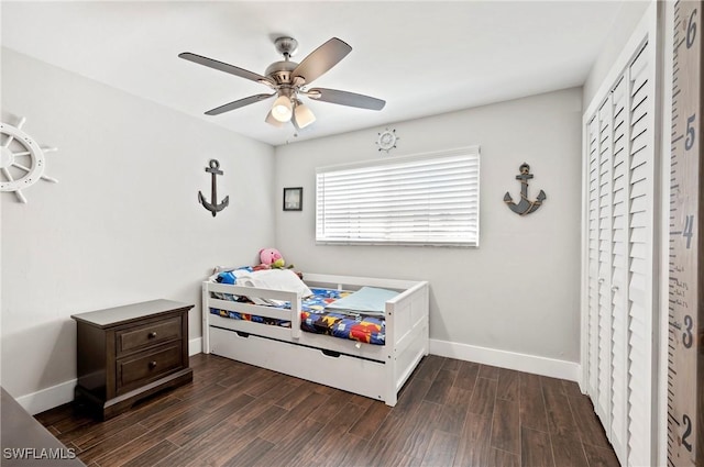 718 Coral Dr, Cape Coral, FL 33904 - bedroom with dark wood-style floors and a ceiling fan