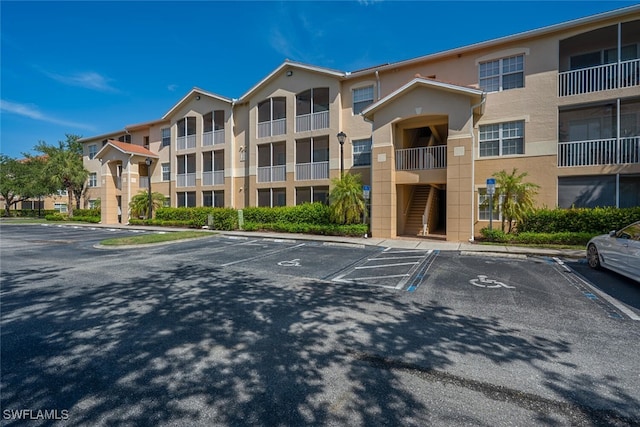 9035 Colby Dr Unit 2322, Fort Myers, FL 33919 - view of apartment building / complex with uncovered parking