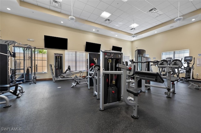 9035 Colby Dr Unit 2322, Fort Myers, FL 33919 - exercise room featuring a paneled ceiling and a high ceiling