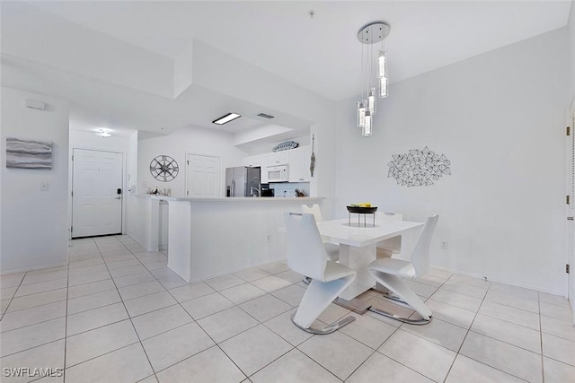 9035 Colby Dr Unit 2322, Fort Myers, FL 33919 - dining space featuring light tile patterned floors and baseboards