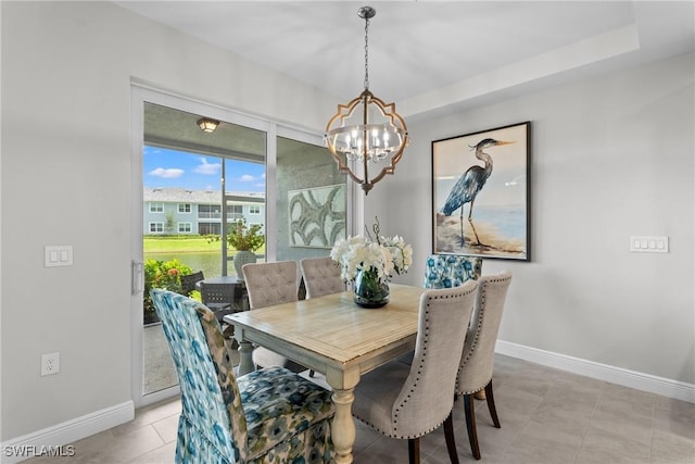 2609 Seychelles Cir Unit 1603, Naples, FL 34112 - dining room with a chandelier and light tile patterned floors