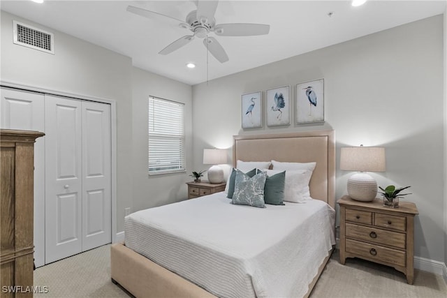 2609 Seychelles Cir Unit 1603, Naples, FL 34112 - bedroom featuring light carpet, a closet, recessed lighting, and a ceiling fan