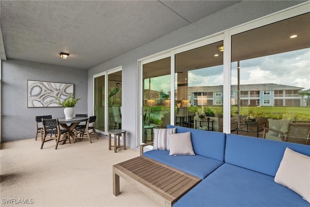 2609 Seychelles Cir Unit 1603, Naples, FL 34112 - sunroom with an outdoor living space and outdoor dining area
