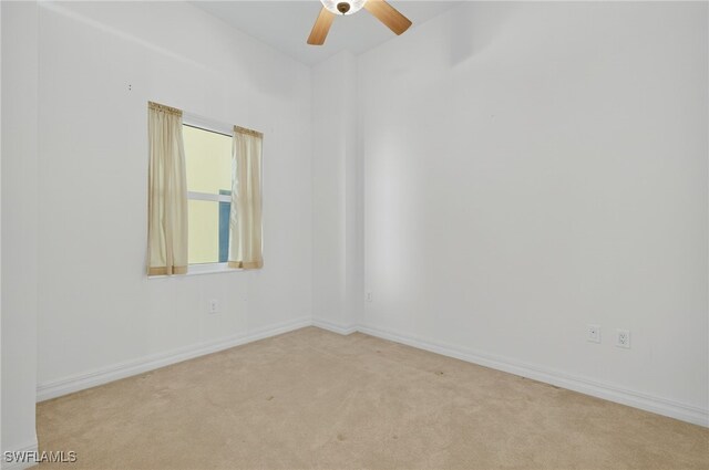 2797 1st St Unit 2004, Fort Myers, FL 33916 - spare room featuring carpet and a ceiling fan