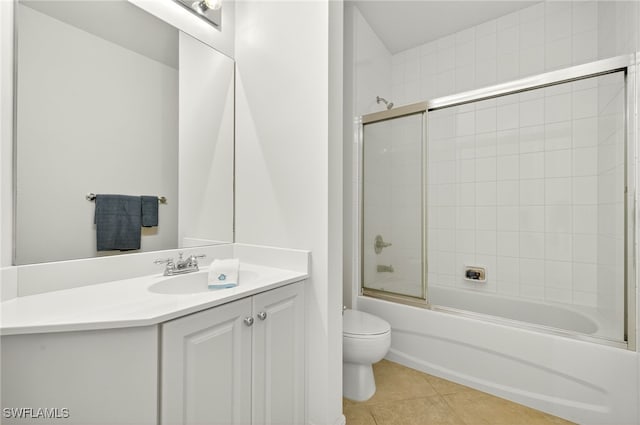 2797 1st St Unit 2004, Fort Myers, FL 33916 - bathroom featuring vanity, tile patterned floors, and shower / bath combination with glass door
