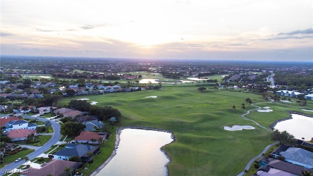 8920 Lely Island Cir, Naples, FL 34113 - aerial view of property's location featuring a large body of water and nearby suburban area