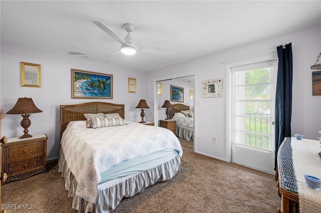 7400 College Pkwy Unit 59C, Fort Myers, FL 33907 - carpeted bedroom featuring a textured ceiling, a ceiling fan, and a closet
