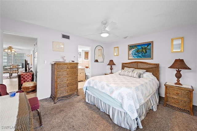 7400 College Pkwy Unit 59C, Fort Myers, FL 33907 - carpeted bedroom featuring ensuite bathroom and ceiling fan