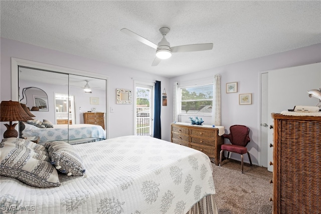7400 College Pkwy Unit 59C, Fort Myers, FL 33907 - bedroom featuring carpet floors, a closet, ceiling fan, and a textured ceiling