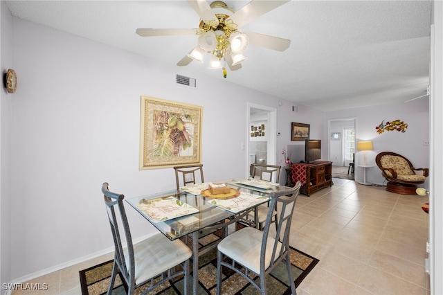 7400 College Pkwy Unit 59C, Fort Myers, FL 33907 - dining room with ceiling fan and light tile patterned flooring