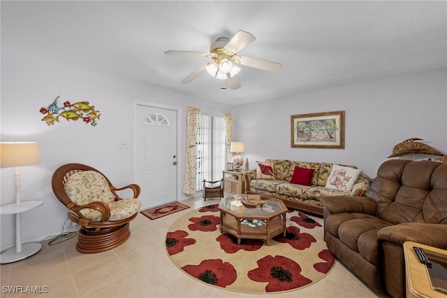 7400 College Pkwy Unit 59C, Fort Myers, FL 33907 - tiled living room with a ceiling fan and a textured ceiling
