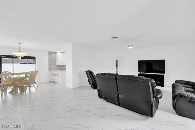 1506 SE 42nd St, Cape Coral, FL 33904 - living area featuring light marble finish floors and ceiling fan