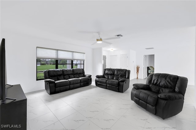 1506 SE 42nd St, Cape Coral, FL 33904 - living area featuring light marble finish floors and a ceiling fan
