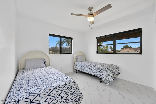 1506 SE 42nd St, Cape Coral, FL 33904 - bedroom with marble finish flooring and a ceiling fan
