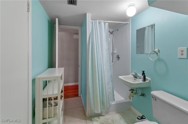 4180 Coconut Cir S, Naples, FL 34104 - bathroom with tile patterned flooring and shower / bath combination with curtain