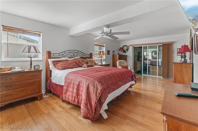 4180 Coconut Cir S, Naples, FL 34104 - bedroom with light wood finished floors and a ceiling fan