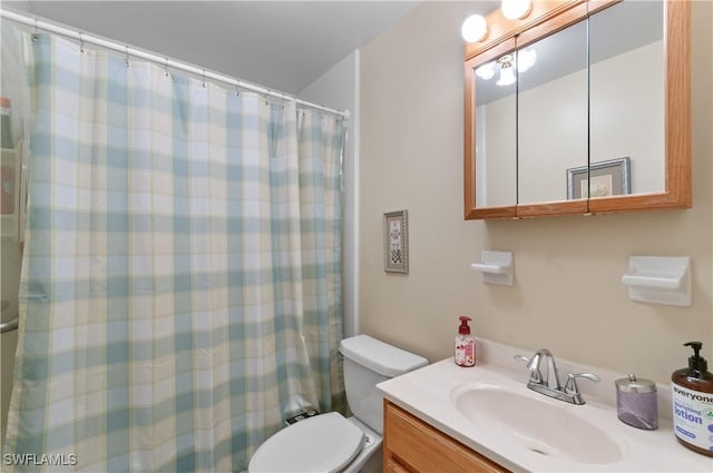 4180 Coconut Cir S, Naples, FL 34104 - bathroom featuring vanity and curtained shower