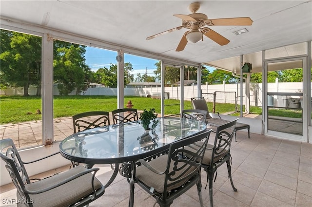 4180 Coconut Cir S, Naples, FL 34104 - sunroom / solarium with outdoor dining area and a ceiling fan