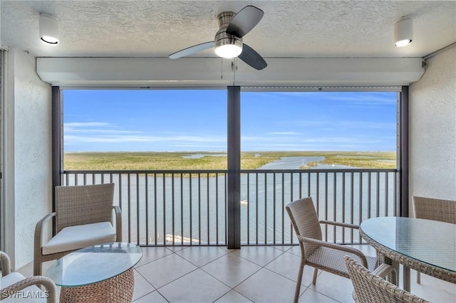 4753 Estero Blvd Unit 1405, Fort Myers Beach, FL 33931 - sunroom / solarium with a water view