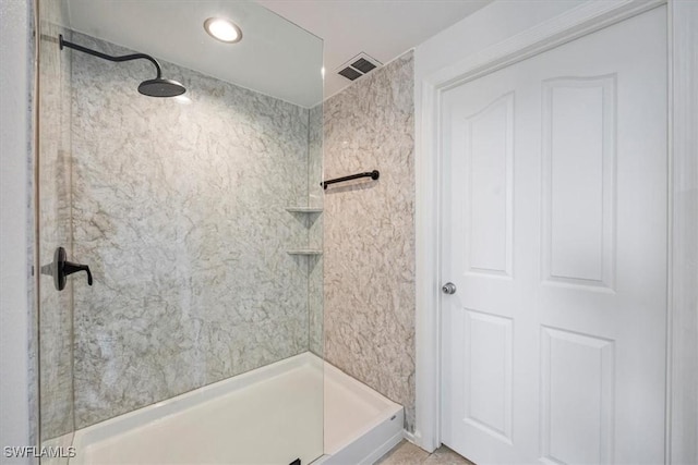 12980 Positano Cir Unit 306, Naples, FL 34105 - bathroom featuring walk in shower and recessed lighting