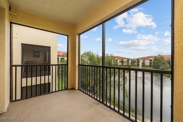 12980 Positano Cir Unit 306, Naples, FL 34105 - balcony featuring a residential view
