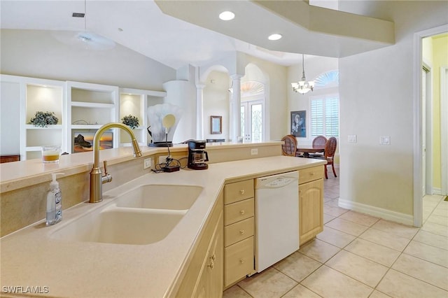 3206 SW 4th Ln, Cape Coral, FL 33991 - kitchen featuring dishwasher, ornate columns, light tile patterned floors, light brown cabinetry, and a chandelier