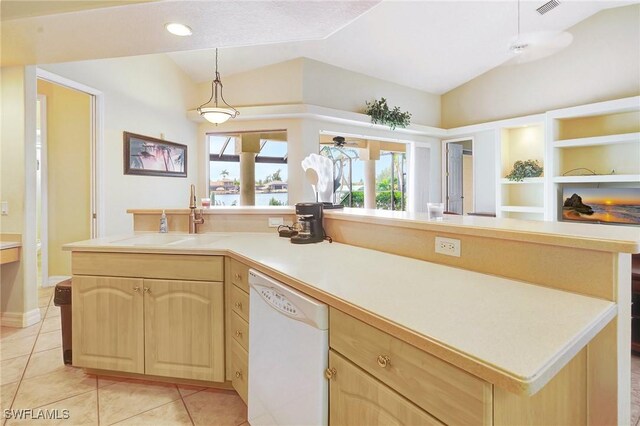 3206 SW 4th Ln, Cape Coral, FL 33991 - kitchen featuring dishwasher, light brown cabinetry, lofted ceiling, light tile patterned floors, and light countertops