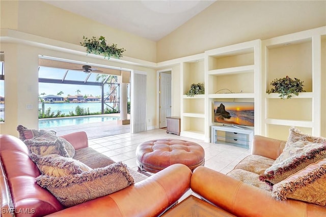 3206 SW 4th Ln, Cape Coral, FL 33991 - tiled living area with built in shelves, a ceiling fan, and high vaulted ceiling