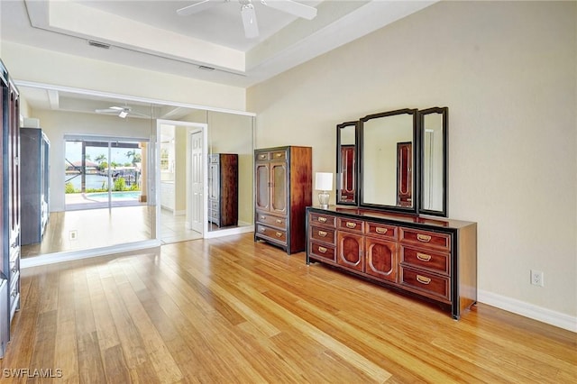3206 SW 4th Ln, Cape Coral, FL 33991 - unfurnished bedroom with light wood-style floors and a ceiling fan
